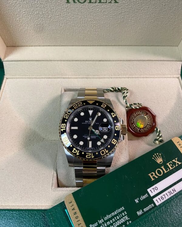 Rolex Steel and Yellow Gold GMT-Master II - V serial - Black Bezel - Black Dial - Oyster Bracelet - 116713LN *FULL SET*